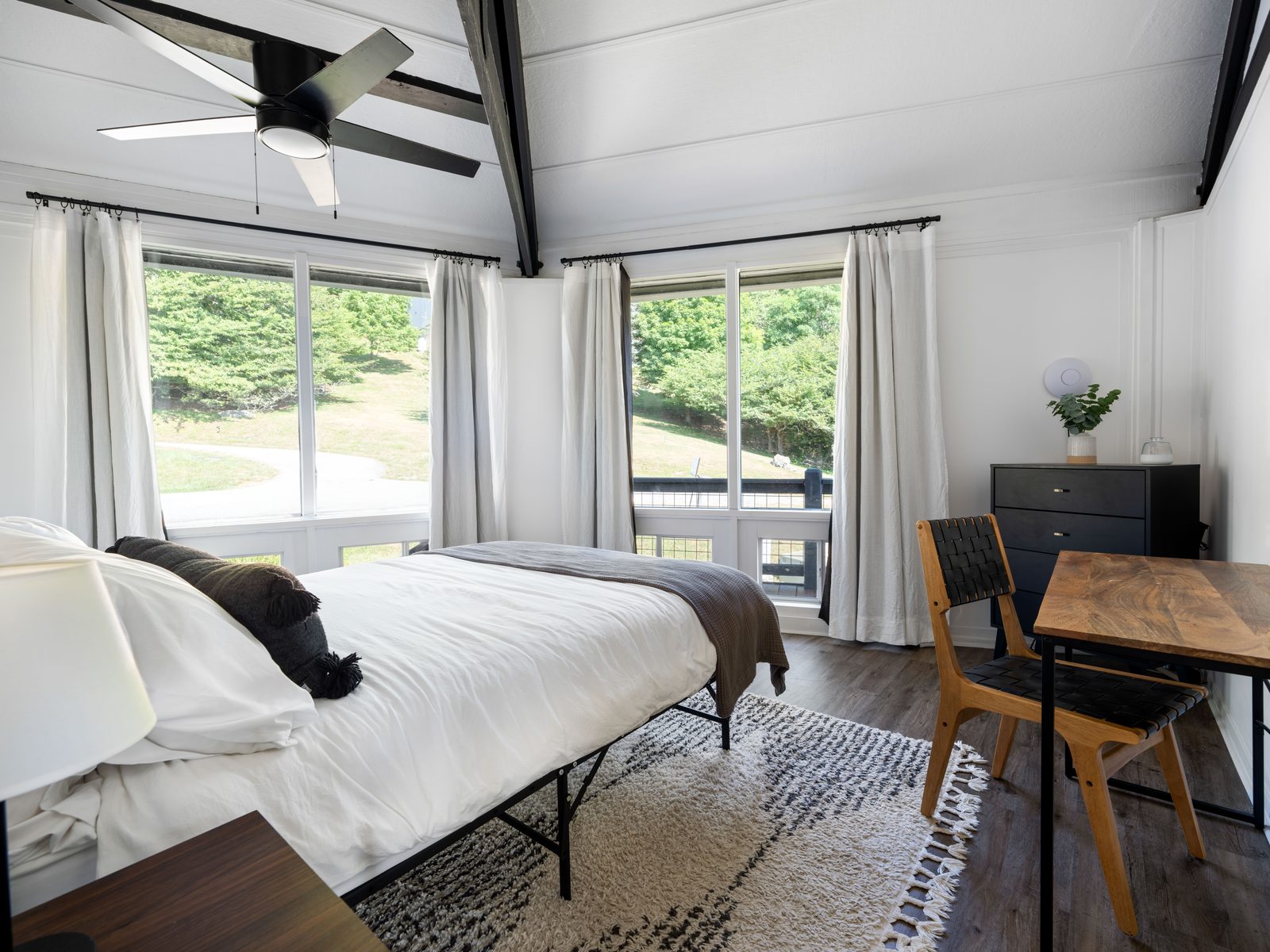 Queen bedroom with mountain views and desk