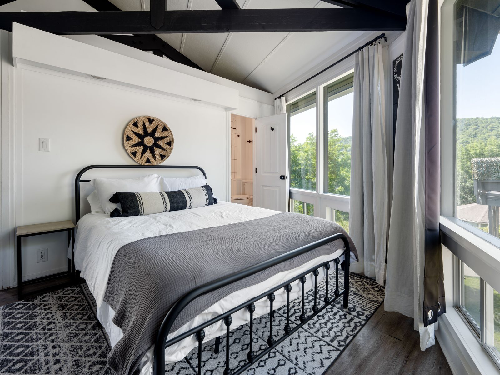 Second queen bedroom with natural light