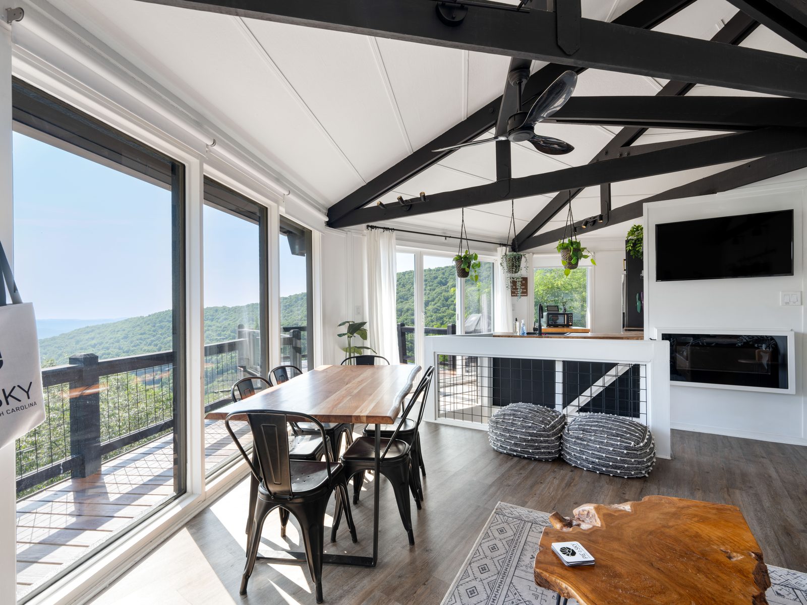 Dining area and kitchen with mountain views