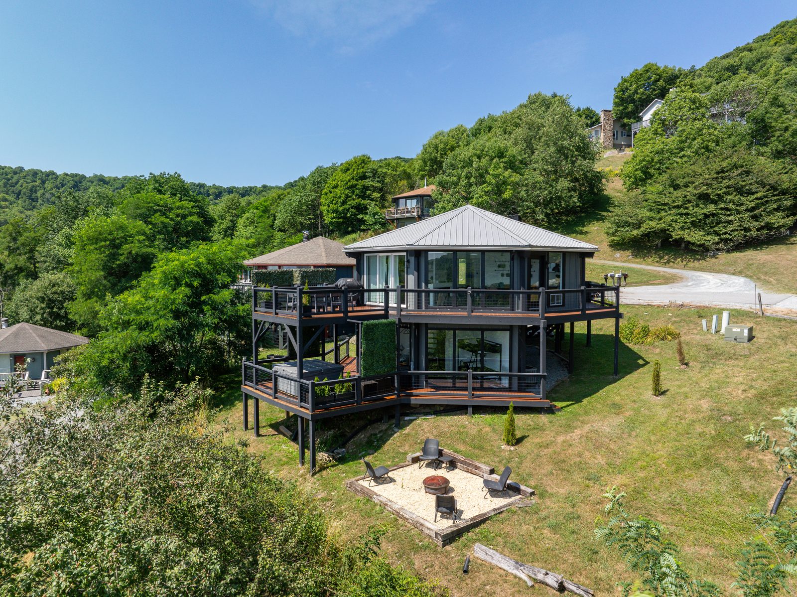 Full view of the retreat with fire pit area