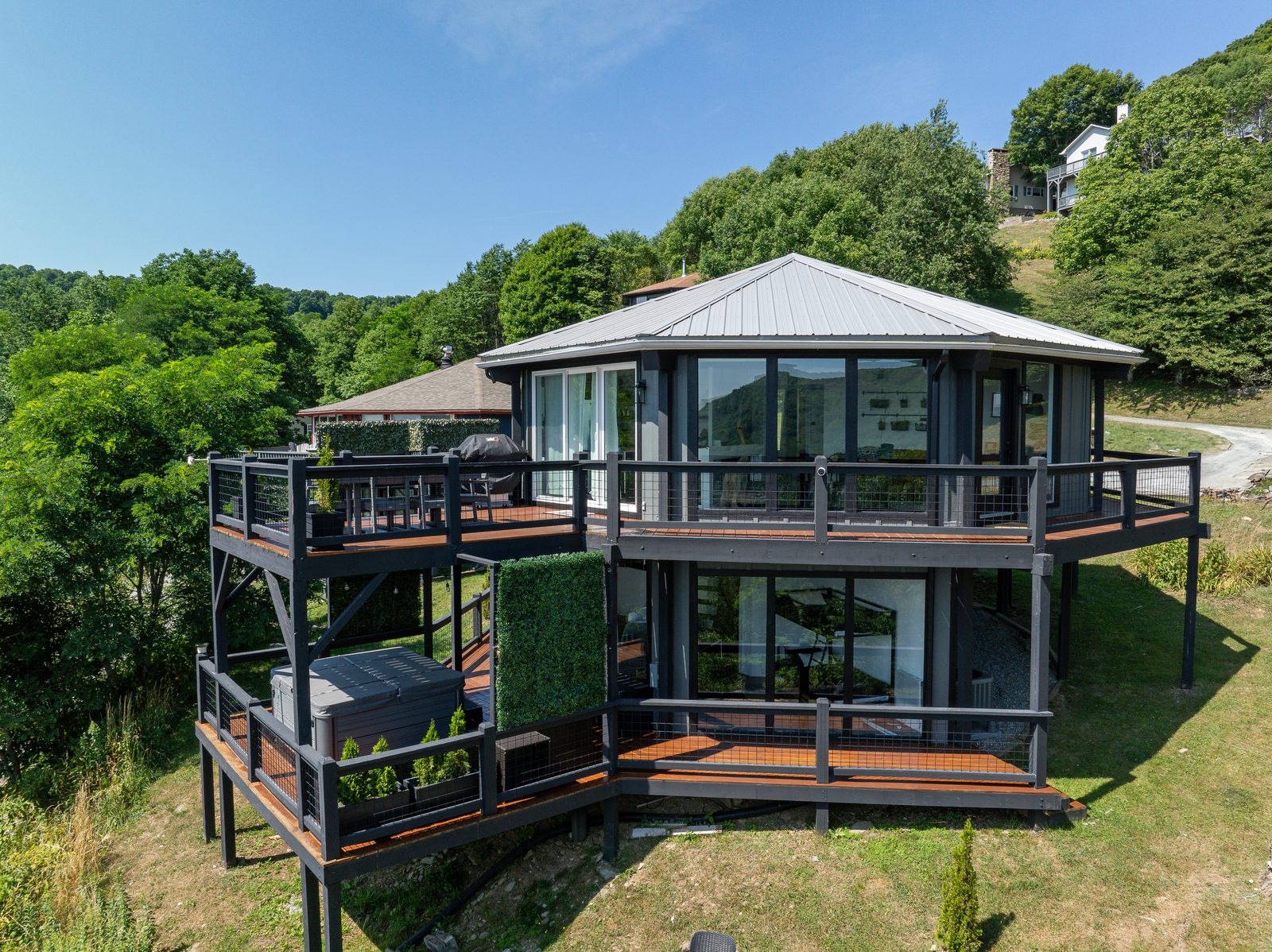 Side view showcasing multi-level decks