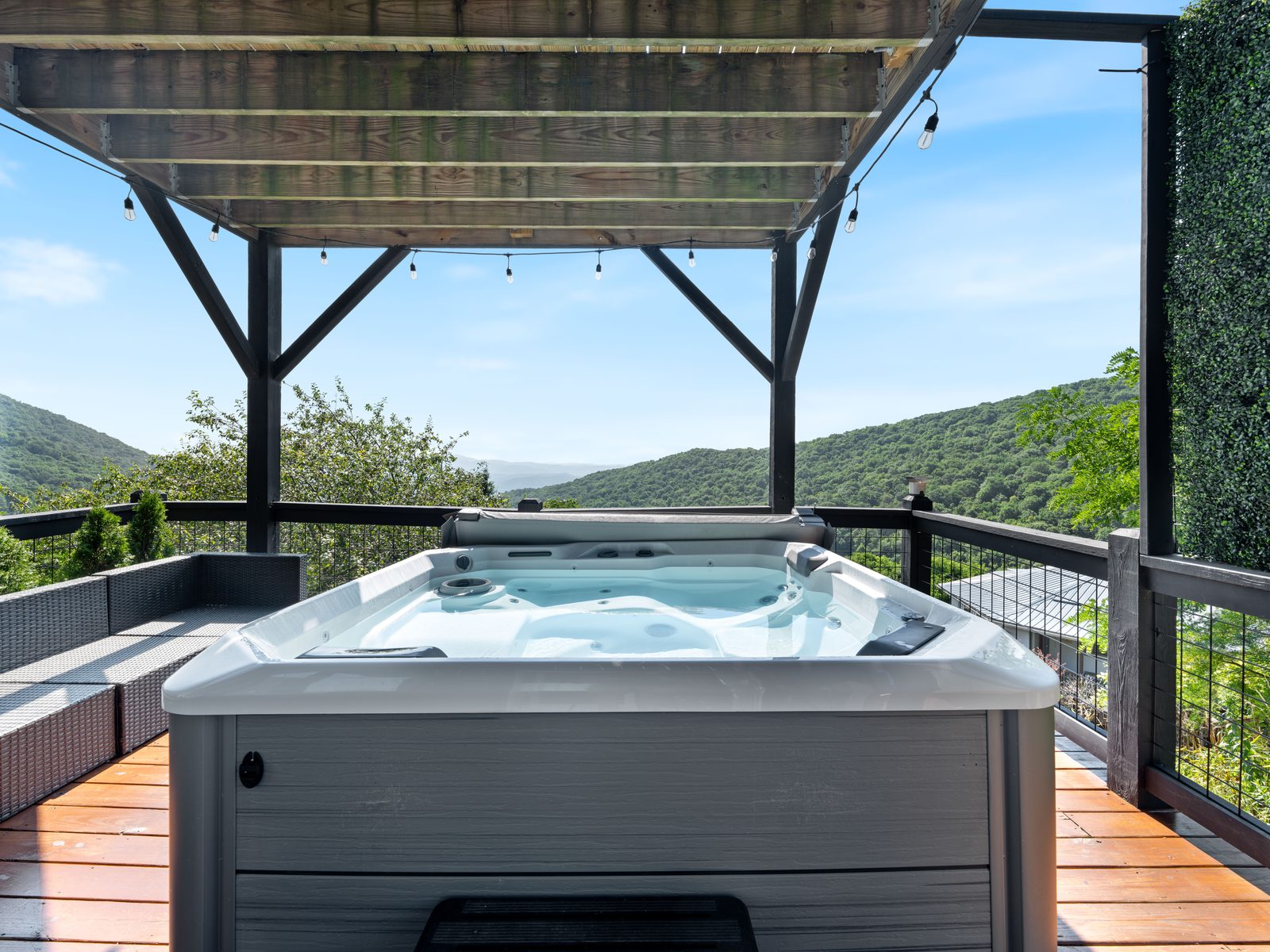 Hot tub area with panoramic mountain views