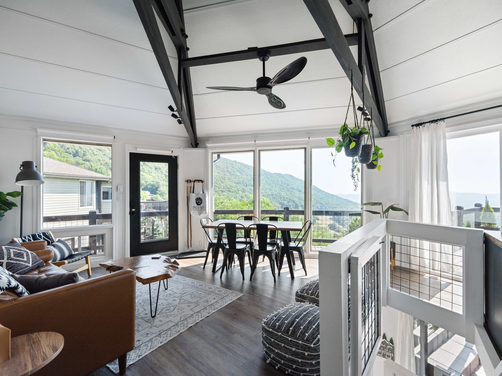 Open living and dining area with panoramic windows